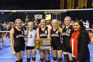 Huntley Project’s 2015 Volleyball Seniors- (left to right) Lauren Frieling, Faith Taylor, Tessa Hultgren, Keera Stookey, Kenzie Smidt, and Senior Student Manager Angelica Jones displaying the newly won 2nd Place Trophy at the State Class B Volleyball Tournament. (Jonathan McNiven photo) 