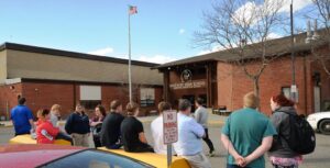 Shepherd students and staff wait outside the Shepherd high school building Monday evening while Yellowstone county sheriff deputies search the buildings for evidence from a bomb threat that was reported. (Photo by Jonathan McNiven)