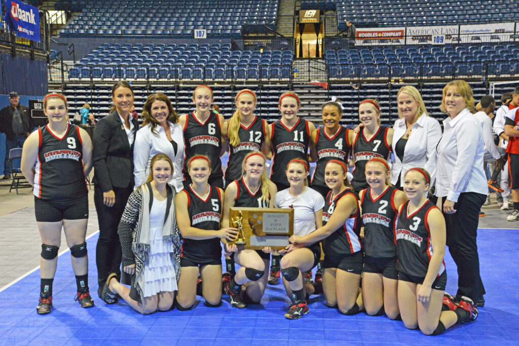 The Huntley Project Lady Red Devils placed second at the state volleyball tournament at Montana State University-Bozeman. Pictured in the back row (l to r): Ashton Albrecht, coach Billie Schaff, coach Sarah Reynolds, Josie Peterson, Alana Graves, Mollee Krum, Kamille Reynolds, Heidi Cranford, coach Iona Stookey, coach Chris Geck. Front row (l to r): Loran Murphy, Hailey Poole, Kama Thom, Kenzie Seitz, Shae Swenson, Addy Hultgren and Maggie Taylor. (Jonathan McNiven photo)