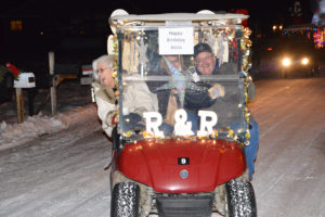 Pete Robison driving the R&R Trading Golf Cart while wife Becky Robison, middle, and Darlene Burnette, left enjoy the ride at Pryor Creek Golf Clubhouse.